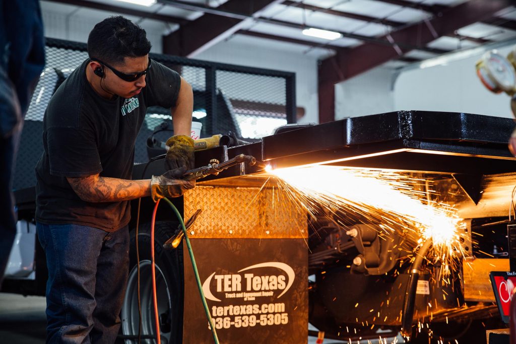 Welding on custom flatbed on work truck